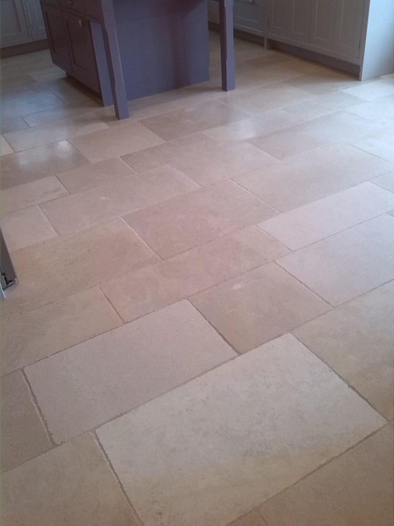 Limestone floor repaired, due to acid damage.  Cleaned and sealed.  Hove, Sussex