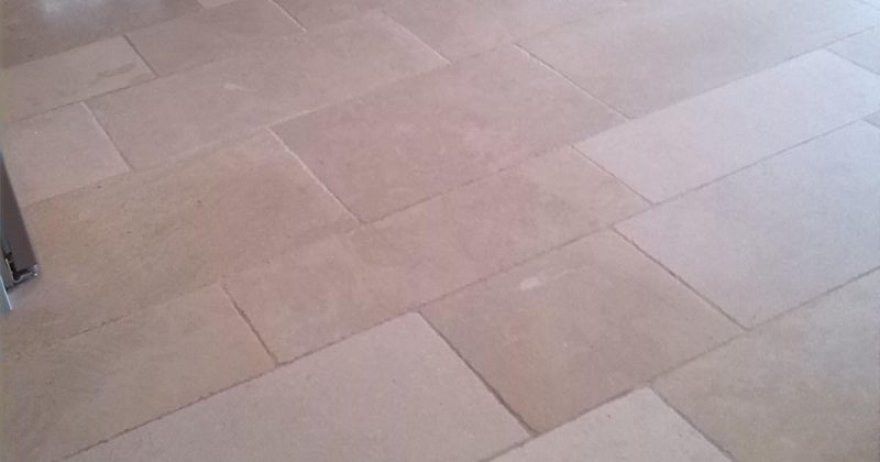 Limestone floor repaired, due to acid damage.  Cleaned and sealed.  Hove, Sussex